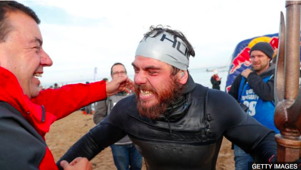 Ross Edgley sets record for round Great Britain swim